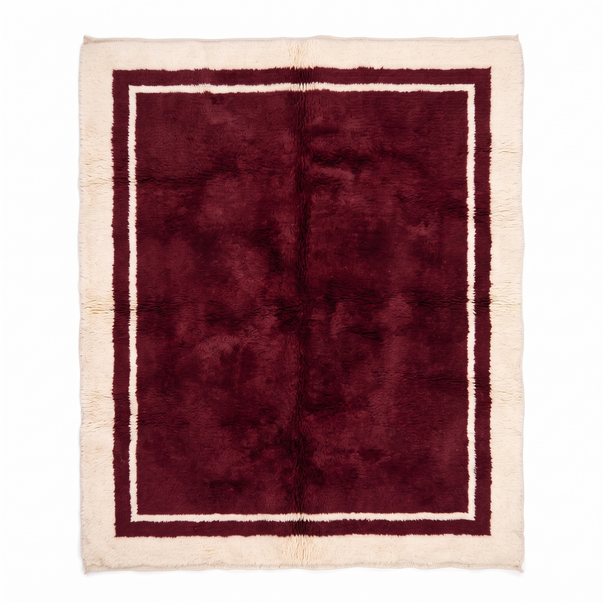 Burgundy Moroccan rug with a cream carved border, hand-knotted wool Beni Mrirt shag rug, top view