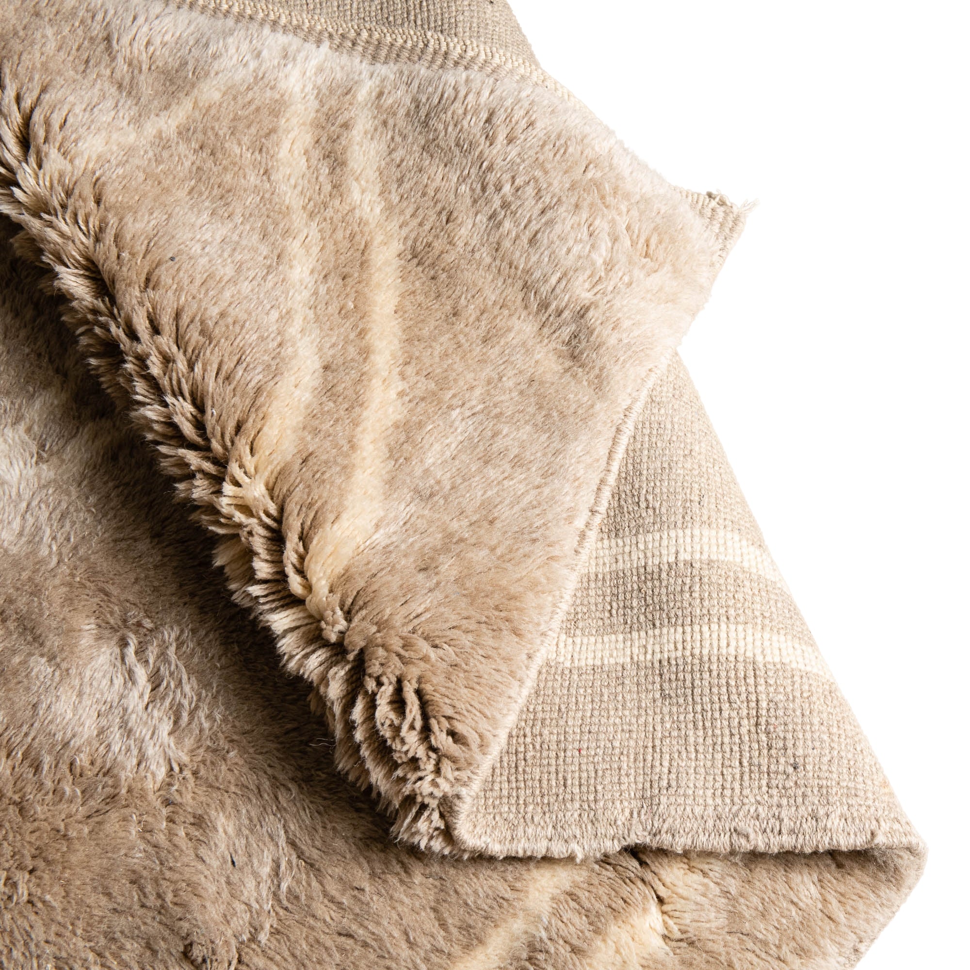 Handmade Moroccan wool rug in sand beige with ivory undulating line motifs