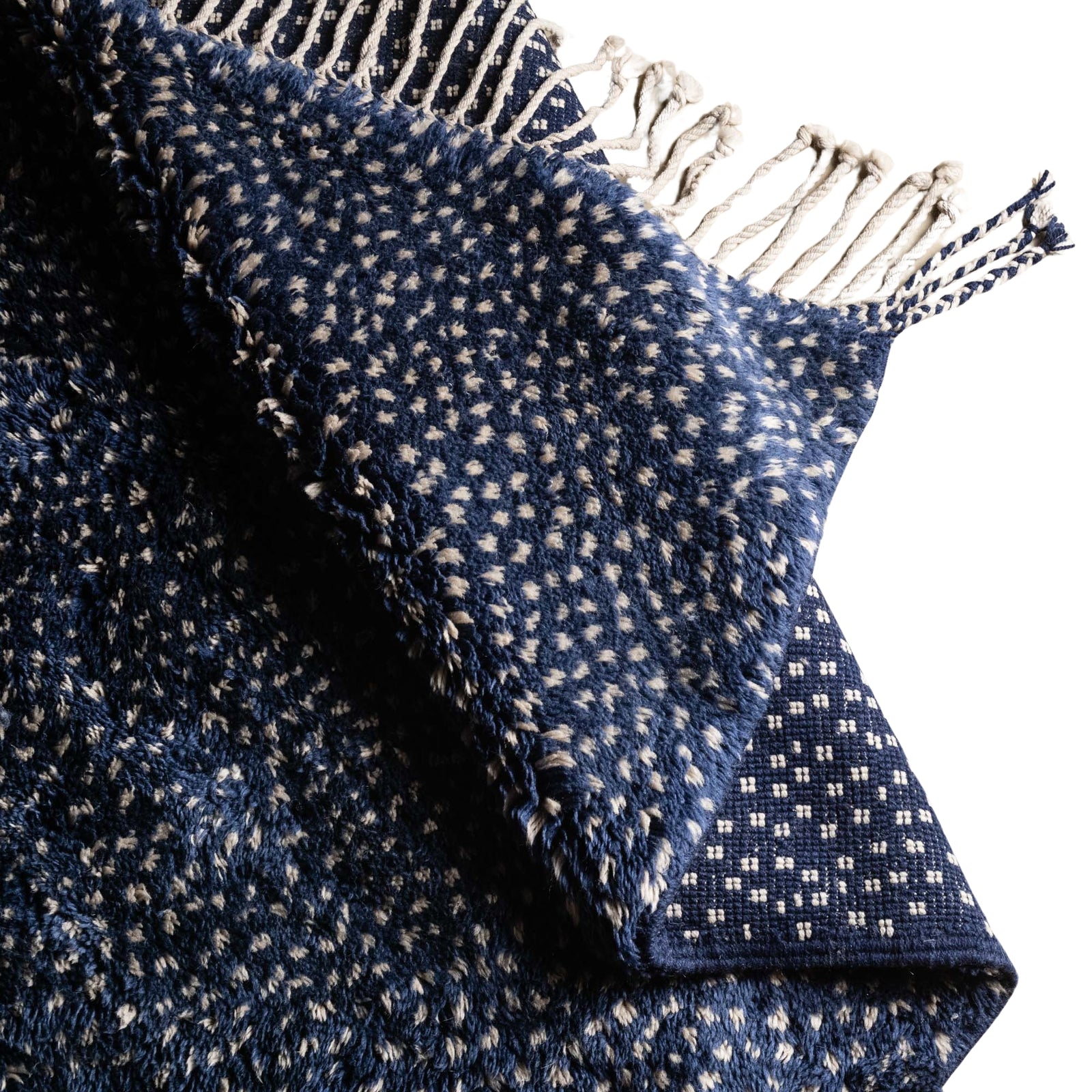 Handmade Moroccan wool rug indigo with carved ivory dot constellation pattern