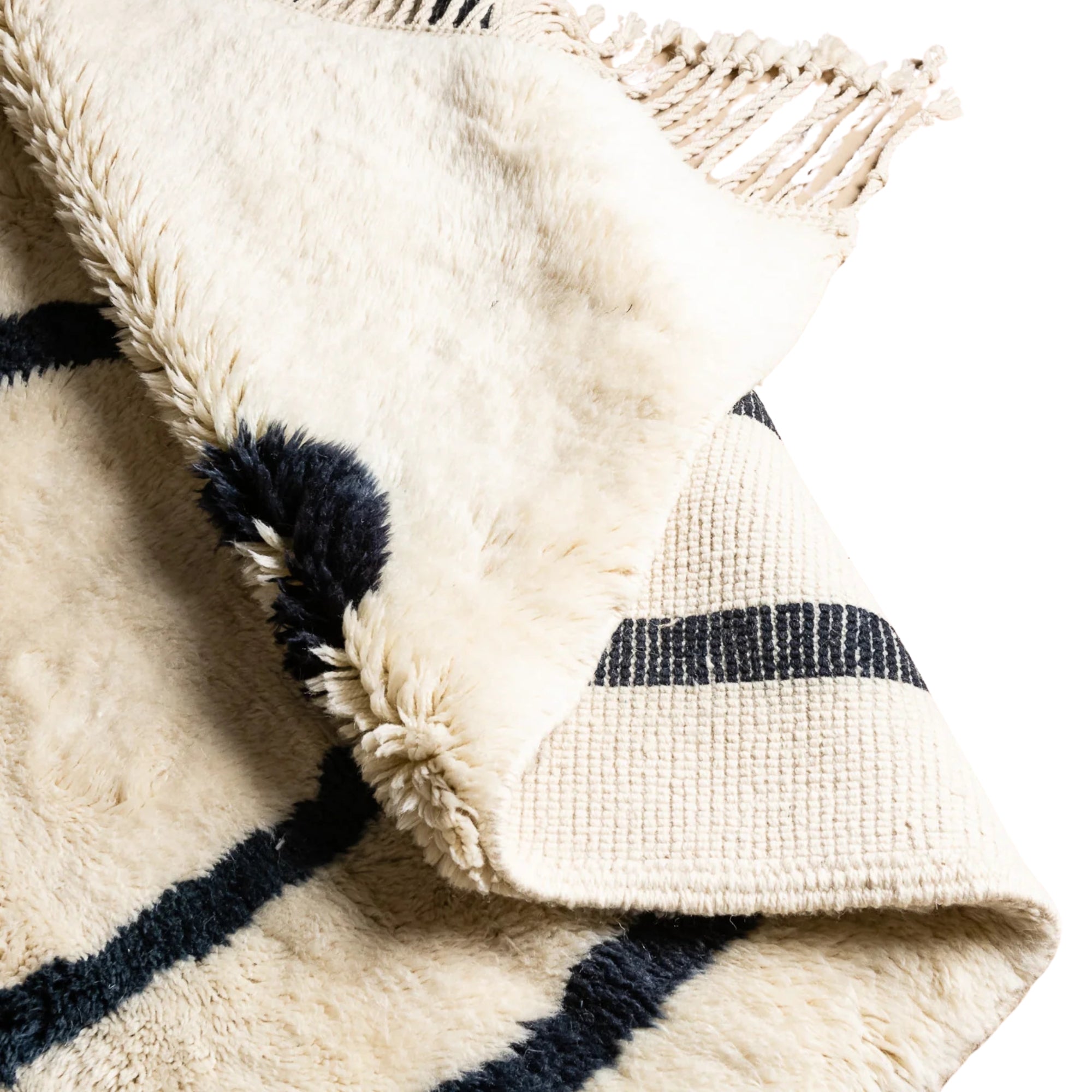Handmade Moroccan wool rug in ivory with charcoal freeform line motif and fringe