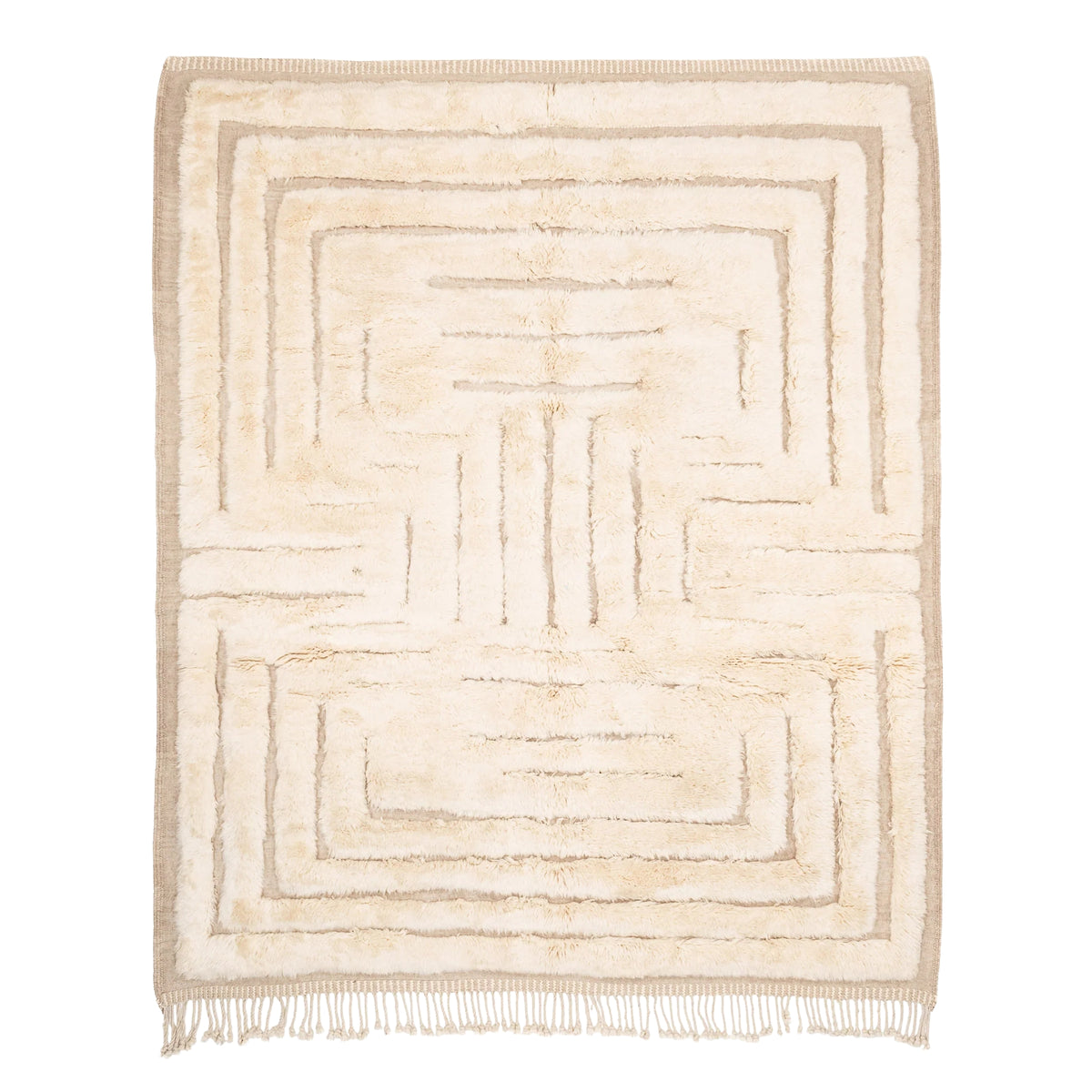Handmade Moroccan wool rug in ivory cream with carved sand-tone labyrinth relief and fringe