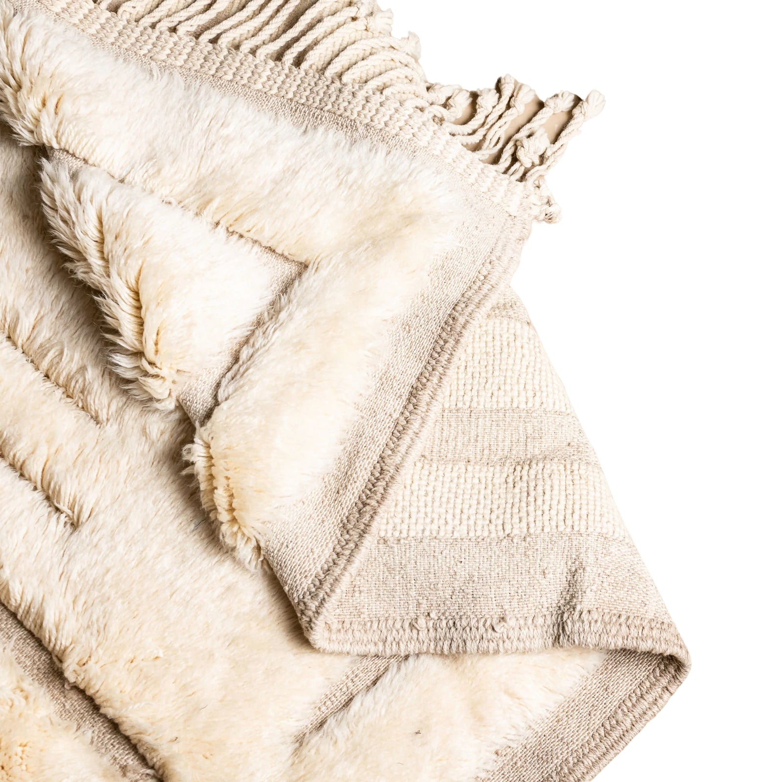 Handmade Moroccan wool rug in ivory cream with carved sand-tone labyrinth relief and fringe