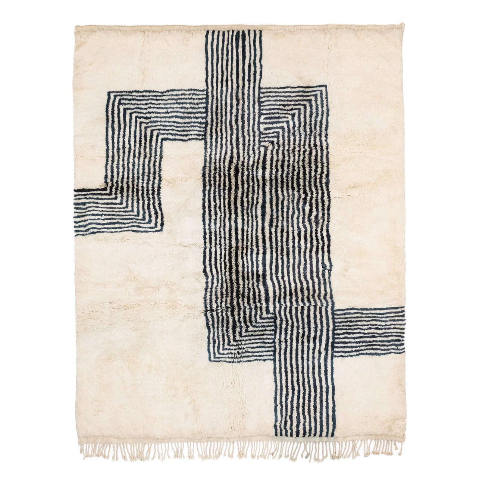 Handmade Moroccan wool rug in cream with navy parallel line chords and fringe