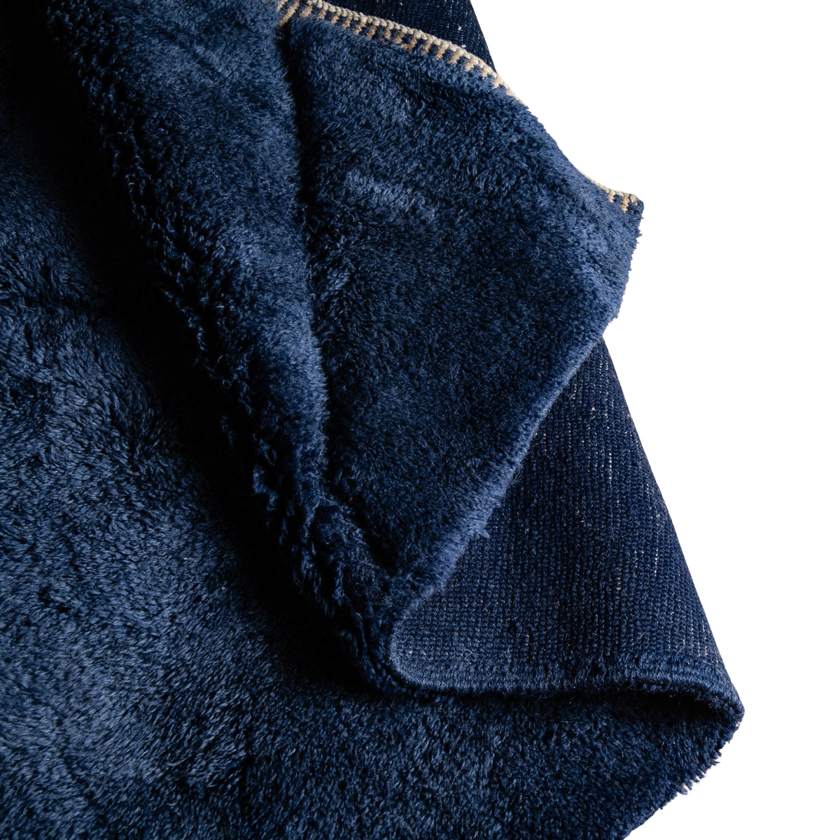 Flipped Handmade Moroccan wool rug in deep navy with carved geometric relief lines