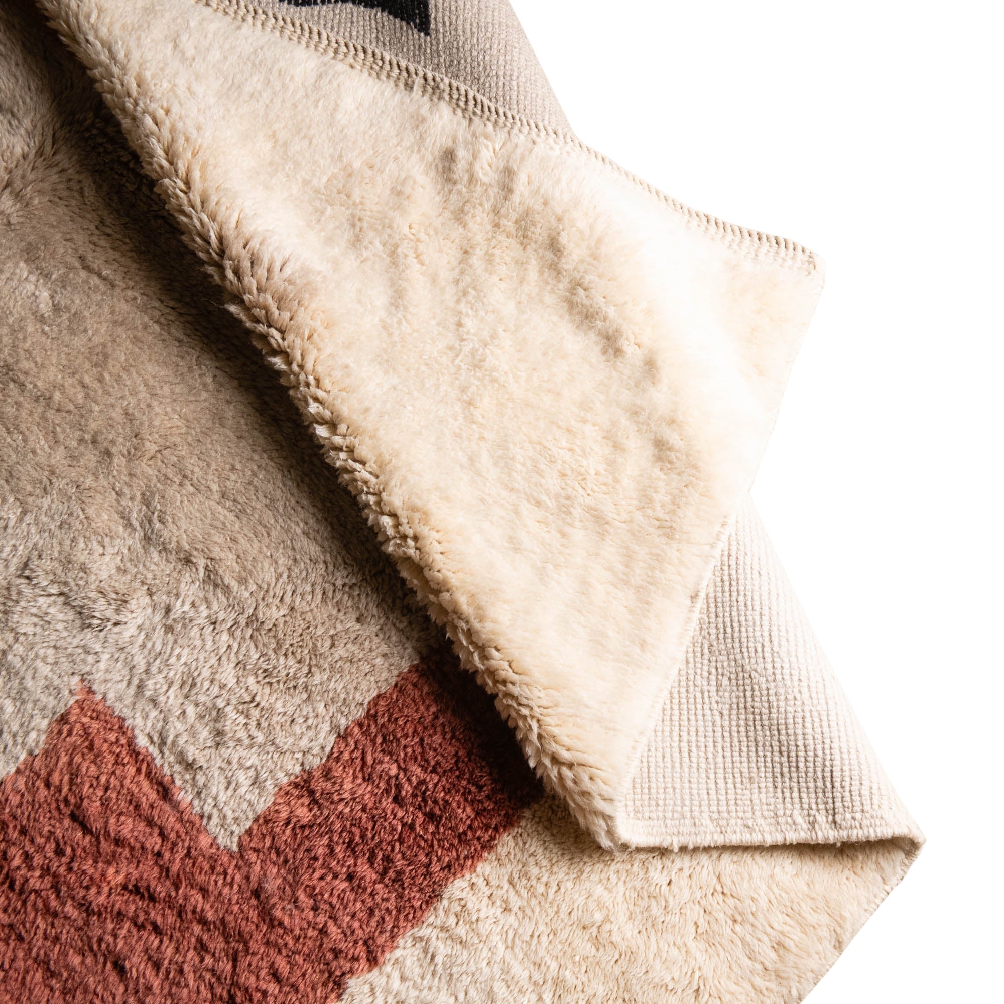 Handmade Moroccan wool rug in cream with rust-red, charcoal, gray, and mustard abstract block design