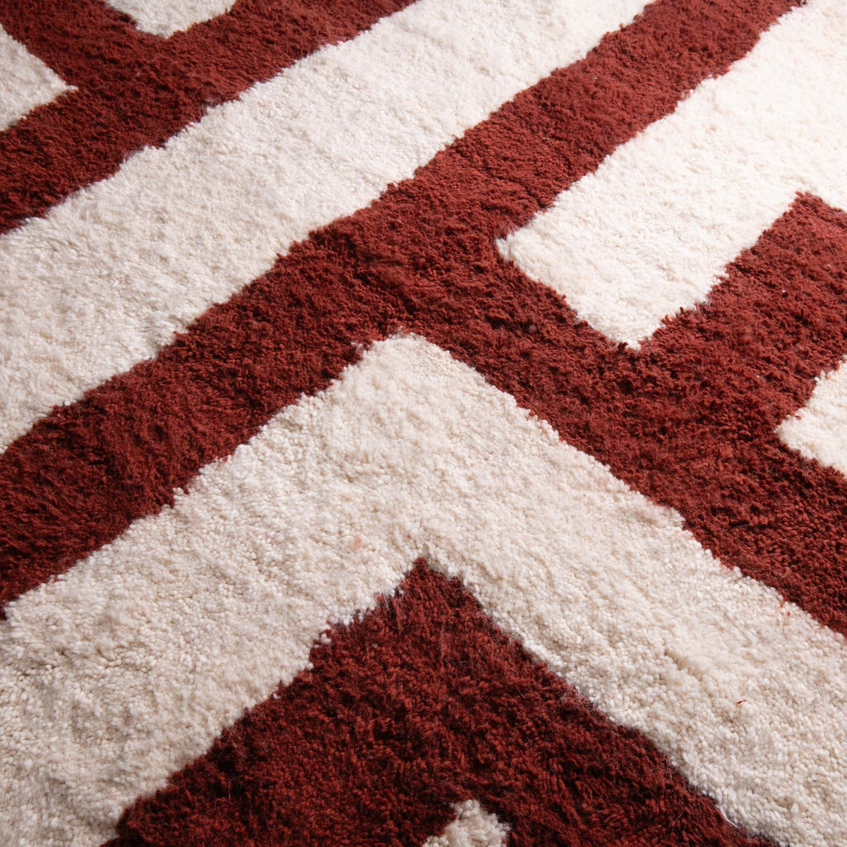 closeup handmade-moroccan-wool-rug-rust-ivory-terracotta-labyrinth